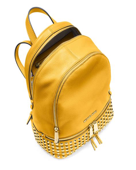 michael kors yellow backpack.